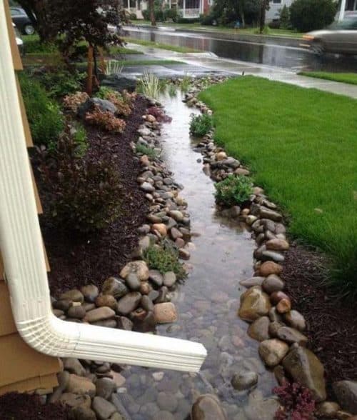 DIY Down Spout Rock Drain Idea
