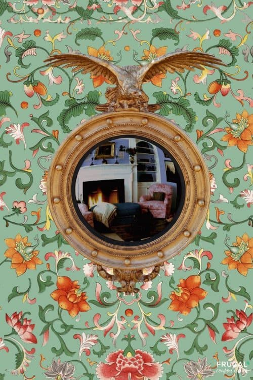 Grandmillennial Eagle Convex Accent Mirror is on green floral wallpaper