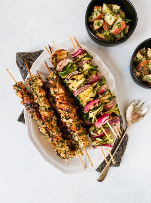 Triple Herb Healthy Chicken Recipe and Zucchini Skewers on white dish