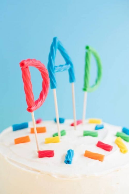 Twizzlers spelling out dad for a father's day cake topper