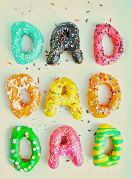 three sets of dad donuts with sprinkles for father's day