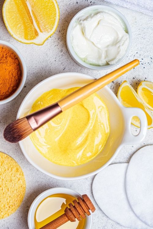 DIY face mask for spa party with bowls and paint brush