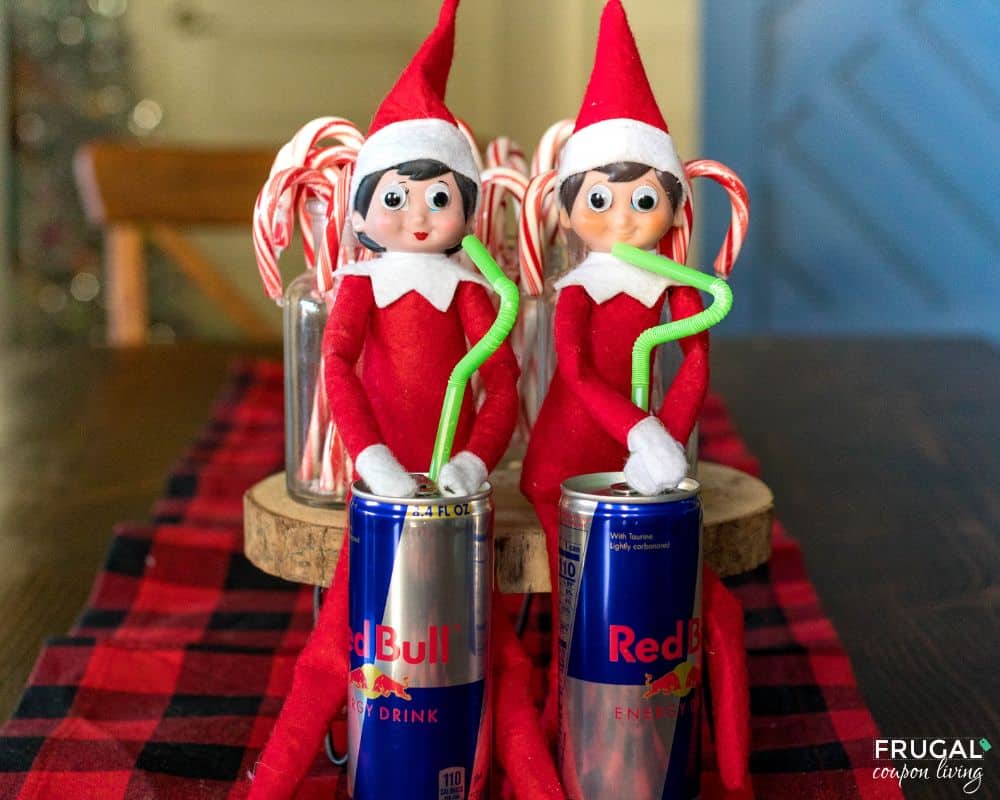 red bull elf on the shelf drinking with crazy eyes