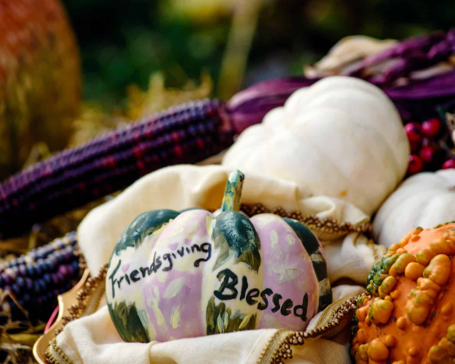 Friendsgiving basket of pumpkins