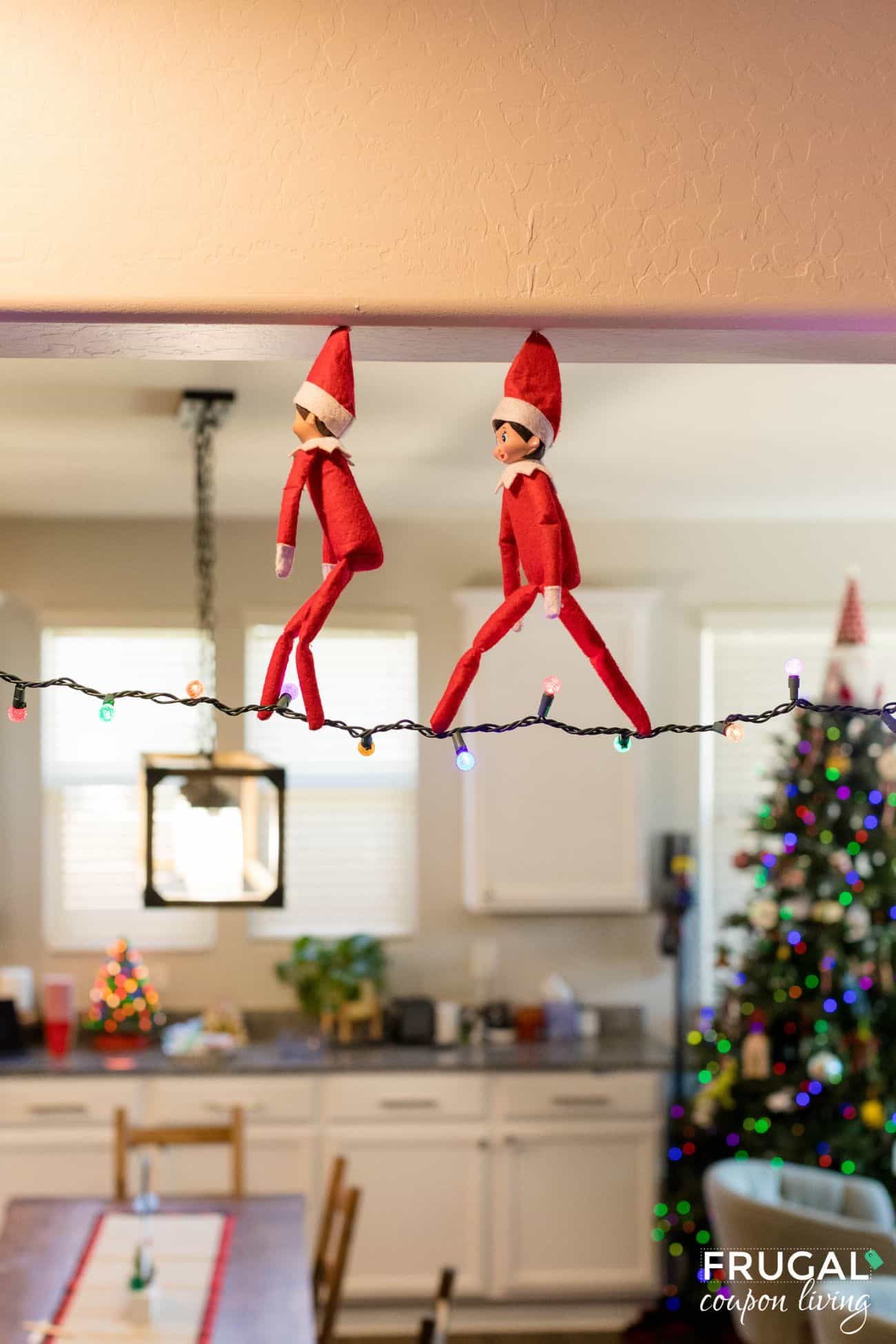 elf on the shelf tight rope walker on a string of lights