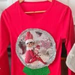 take the elf on the shelf anywhere when you put him inside a t-shirt
